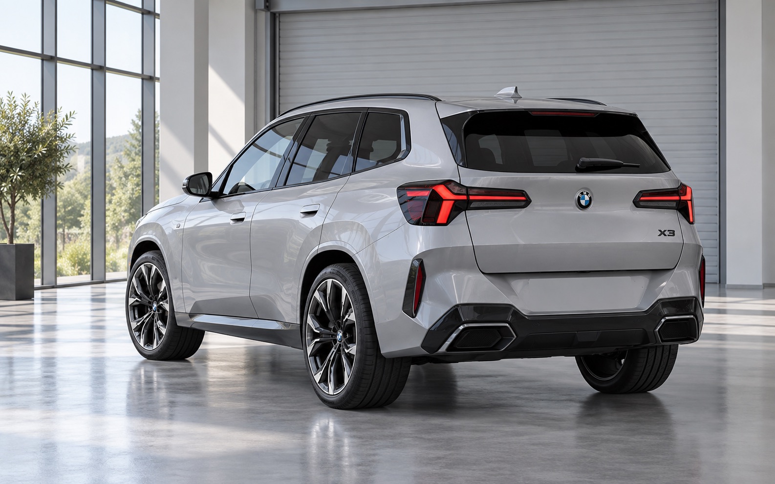 Srebrne BMW X3 w jasnej hali wydania samochodów